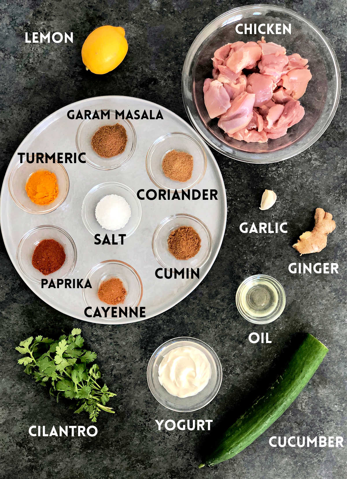 Ingredients on a dark gray board.