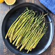 air fryer asparagus on a black plate