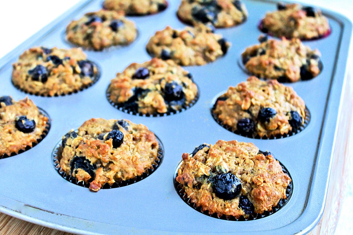 Flaxseed muffins in muffin pan.