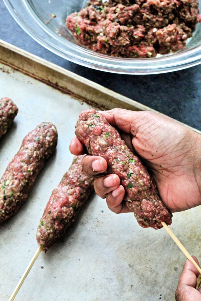 forming a kebab on a skewer