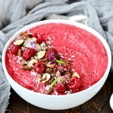 Raspberry Coconut Smoothie Bowl in white bowl.