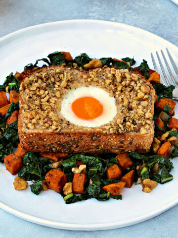 Walnut-Crusted Toad in a Hole with Sweet Potato & Kale Hash