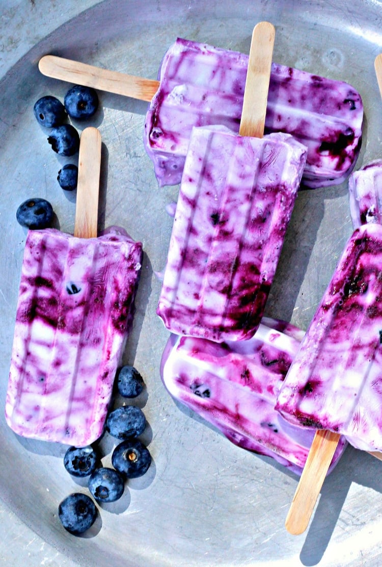 4 Ingredient Blueberry Yogurt Popsicles on a silver platter