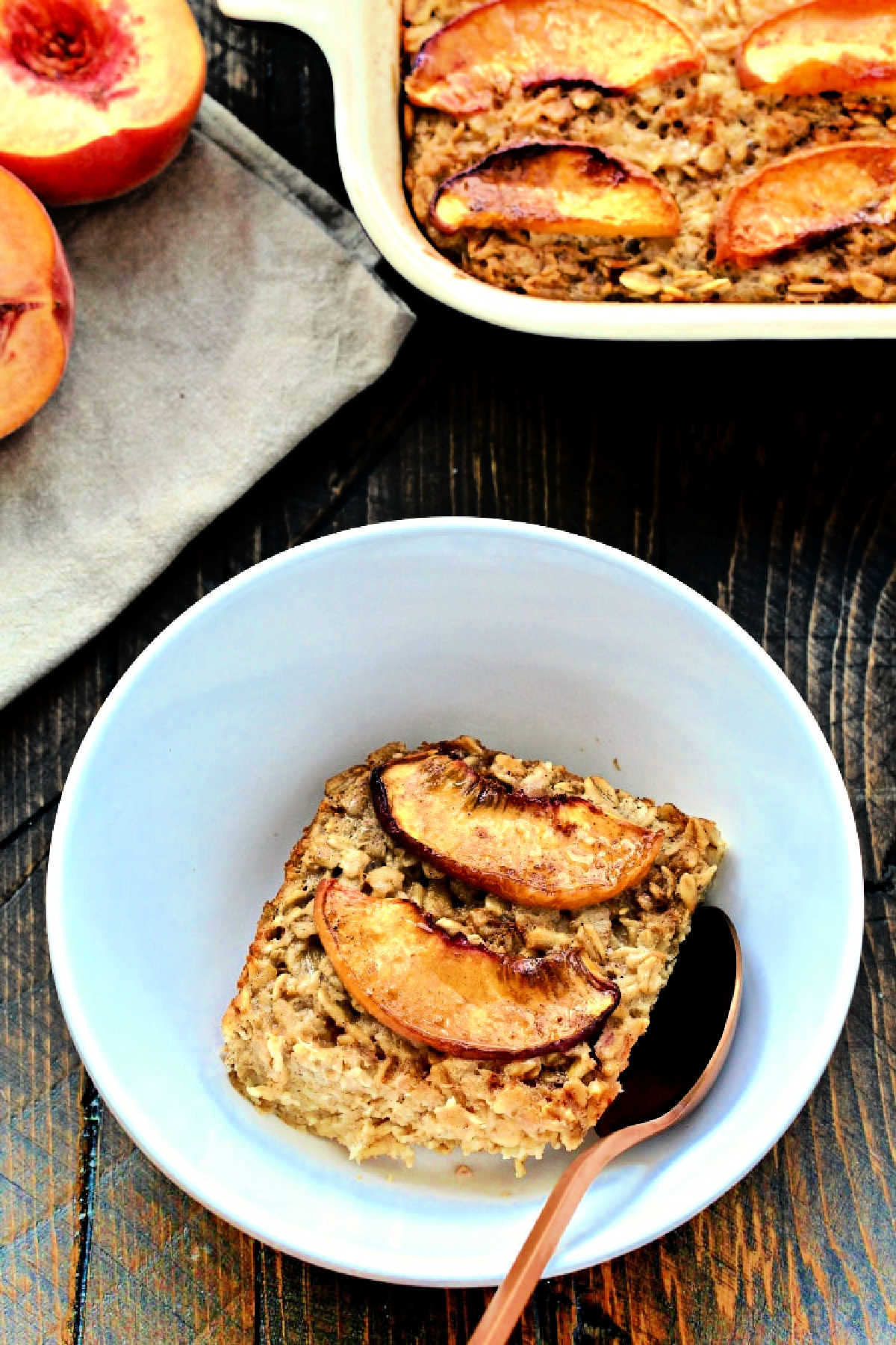 Piece of baked oatmeal in a white bowl.