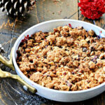 Berry crisp in individual metal serving dish