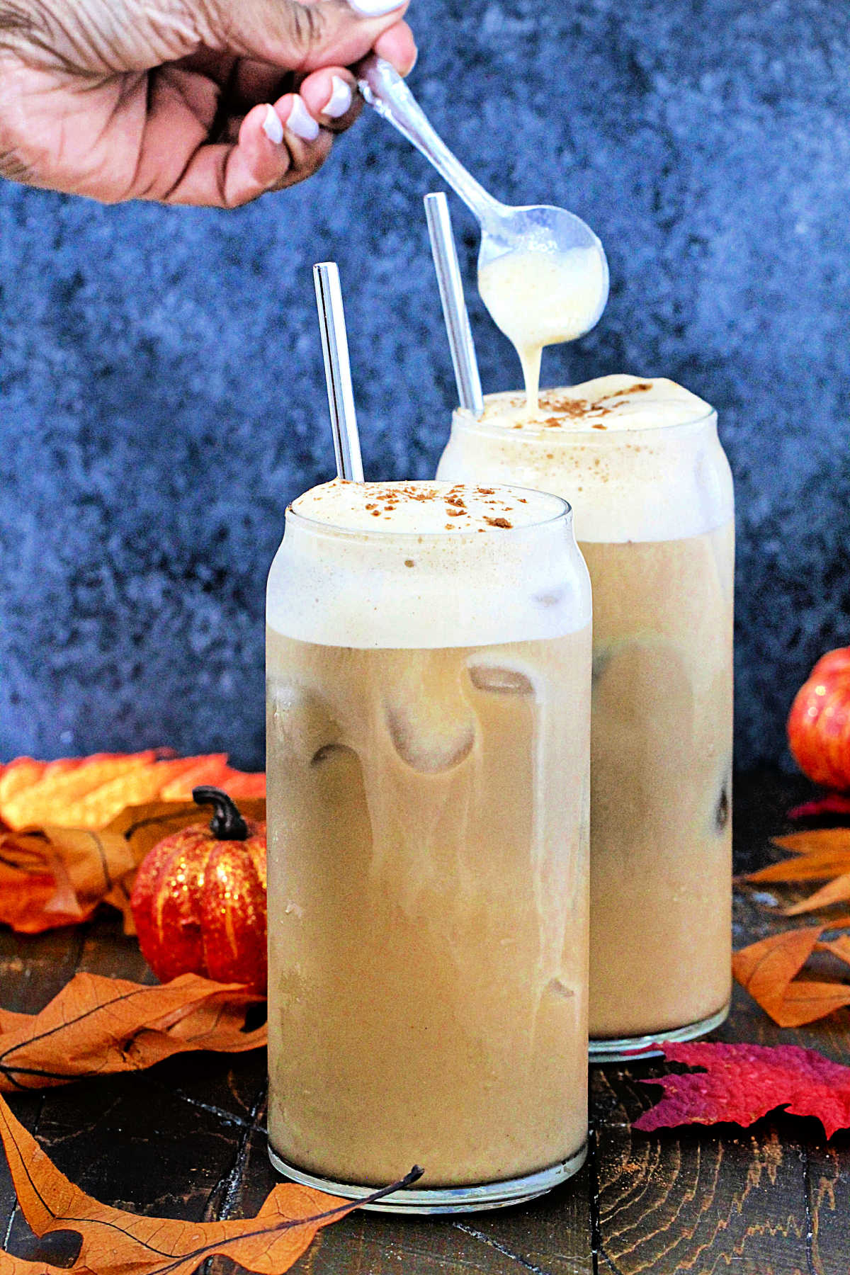 Dairy-Free Pumpkin Cream Cold Brew in 2 tall glasses.