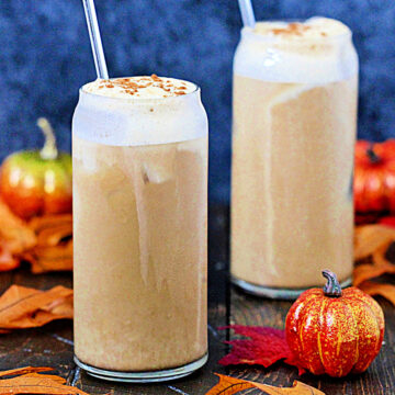 Dairy-Free Pumpkin Cream Cold Brew in 2 tall glasses.