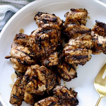 balsamic grilled chicken on a white plate