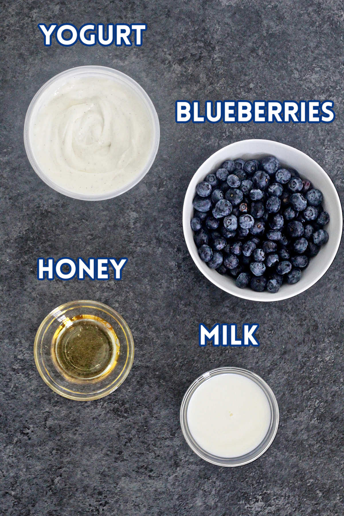 popsicle ingredients on a gray board.