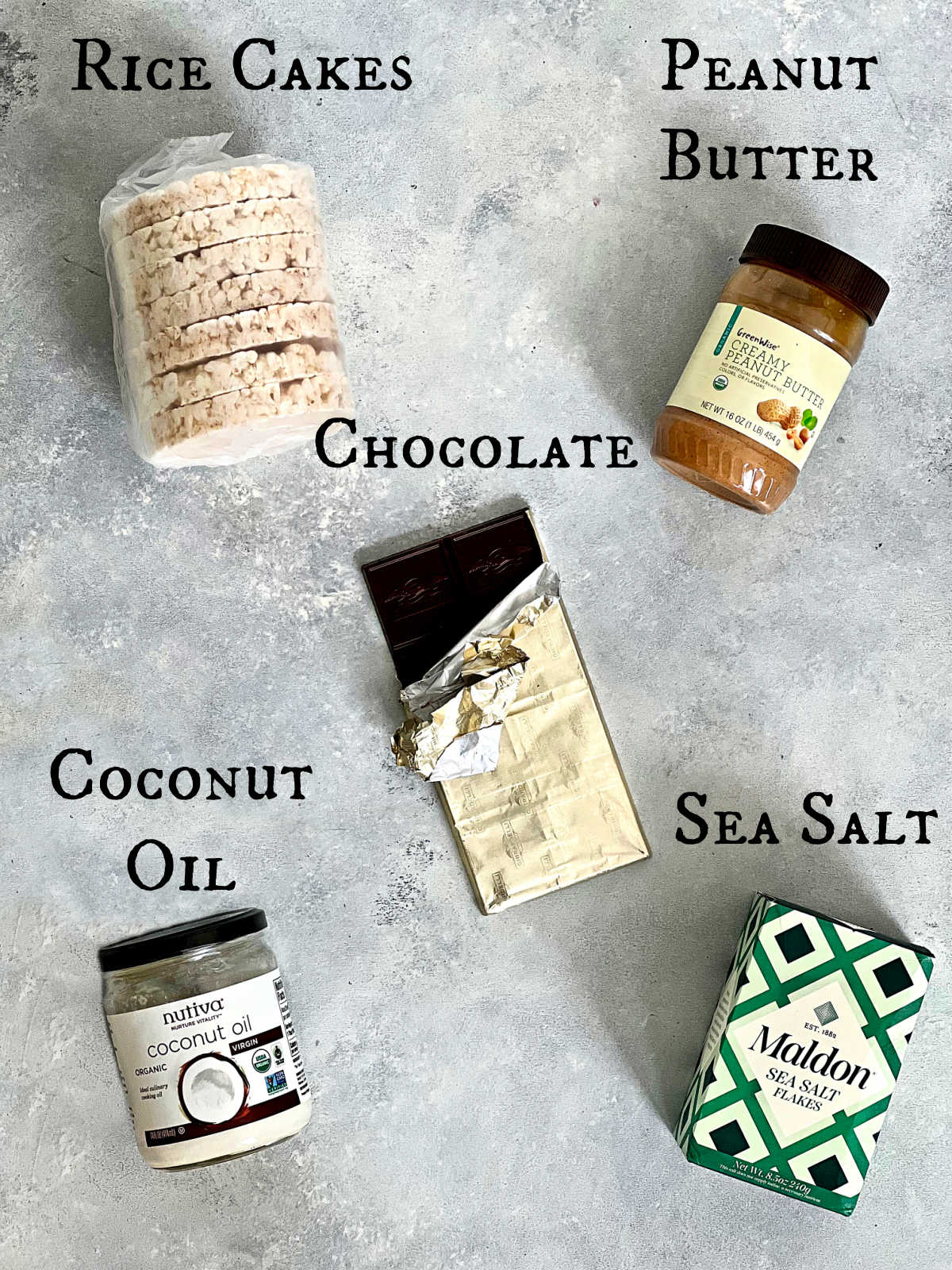 Ingredients for peanut butter rice cake on a gray board.