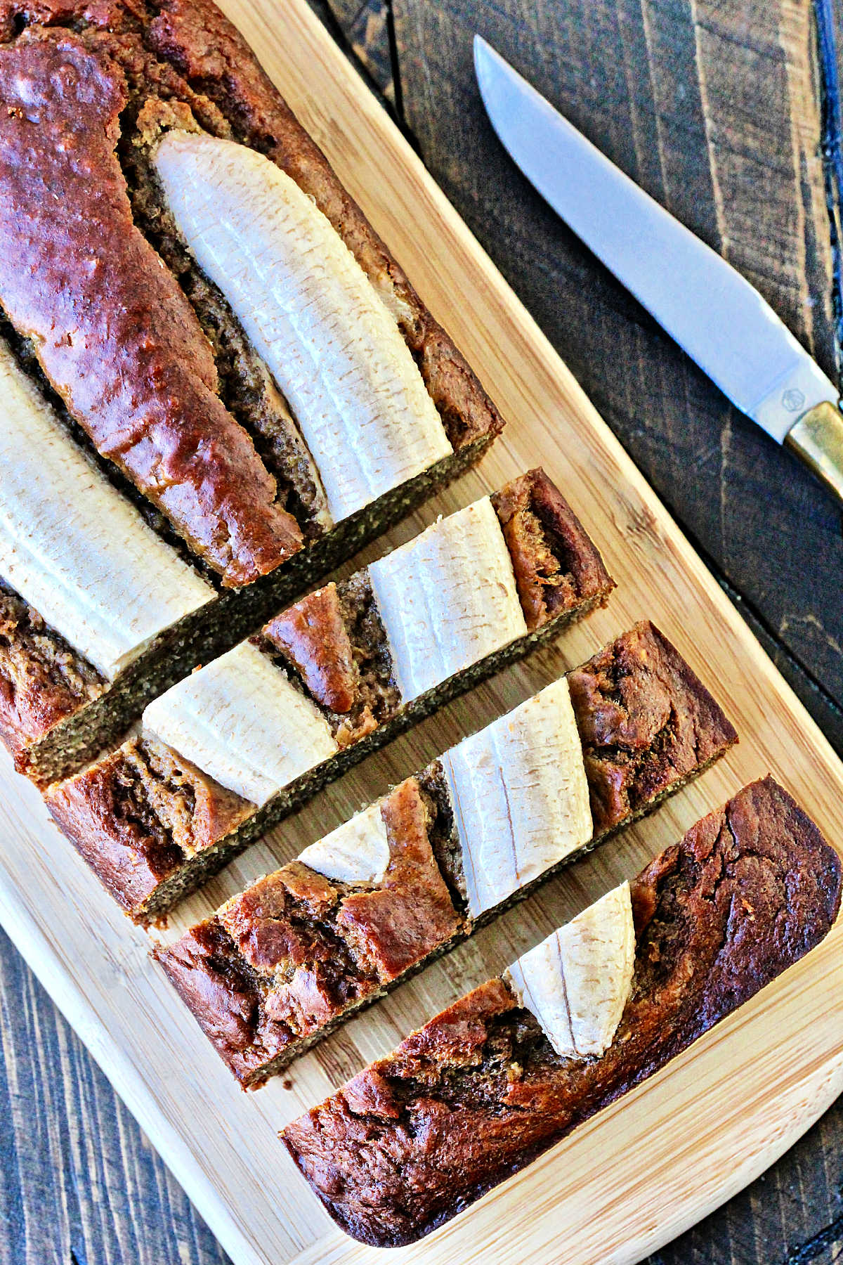 Overhead shot of banana flaxseed bread cut in slices.