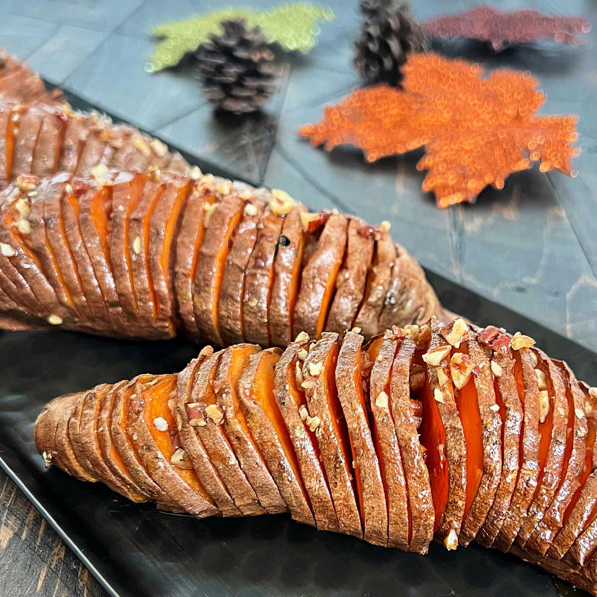 Hasselback sweet potatoes on a tray