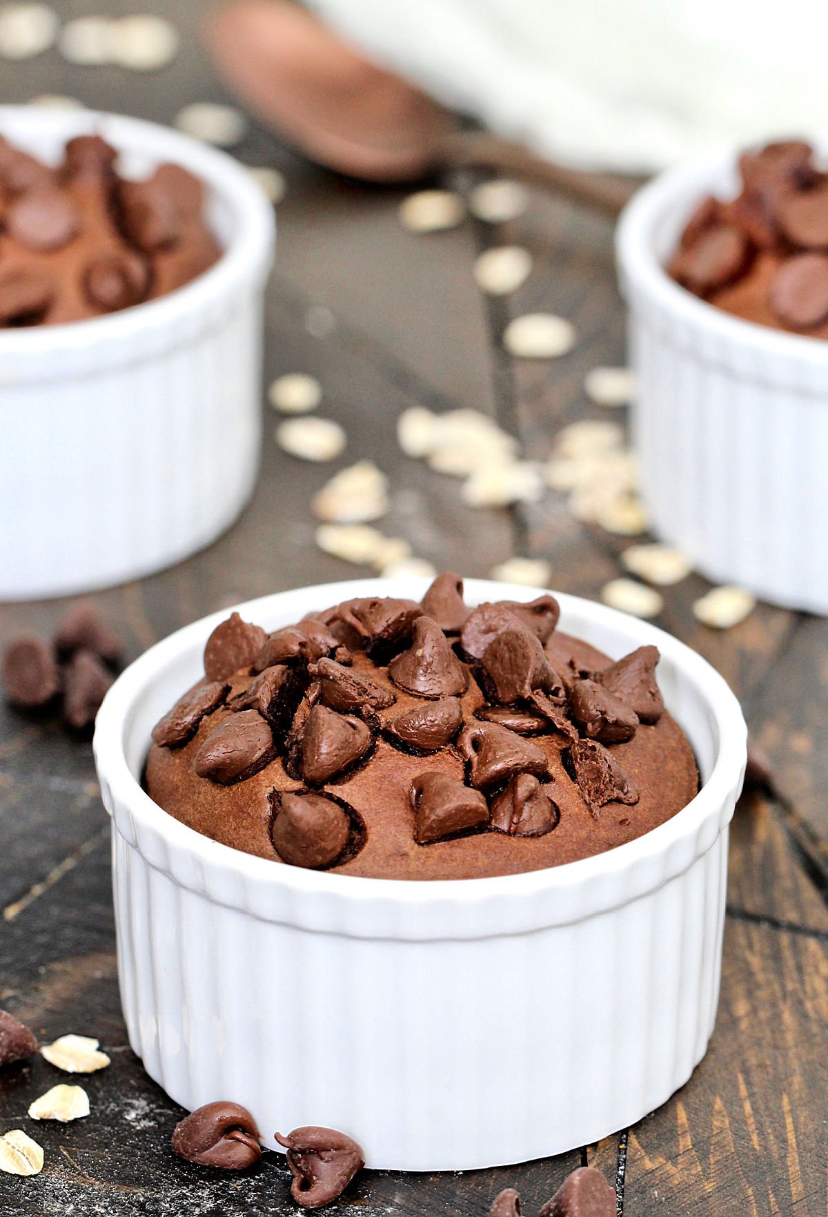 Chocolate Baked Oats in white ramekins.