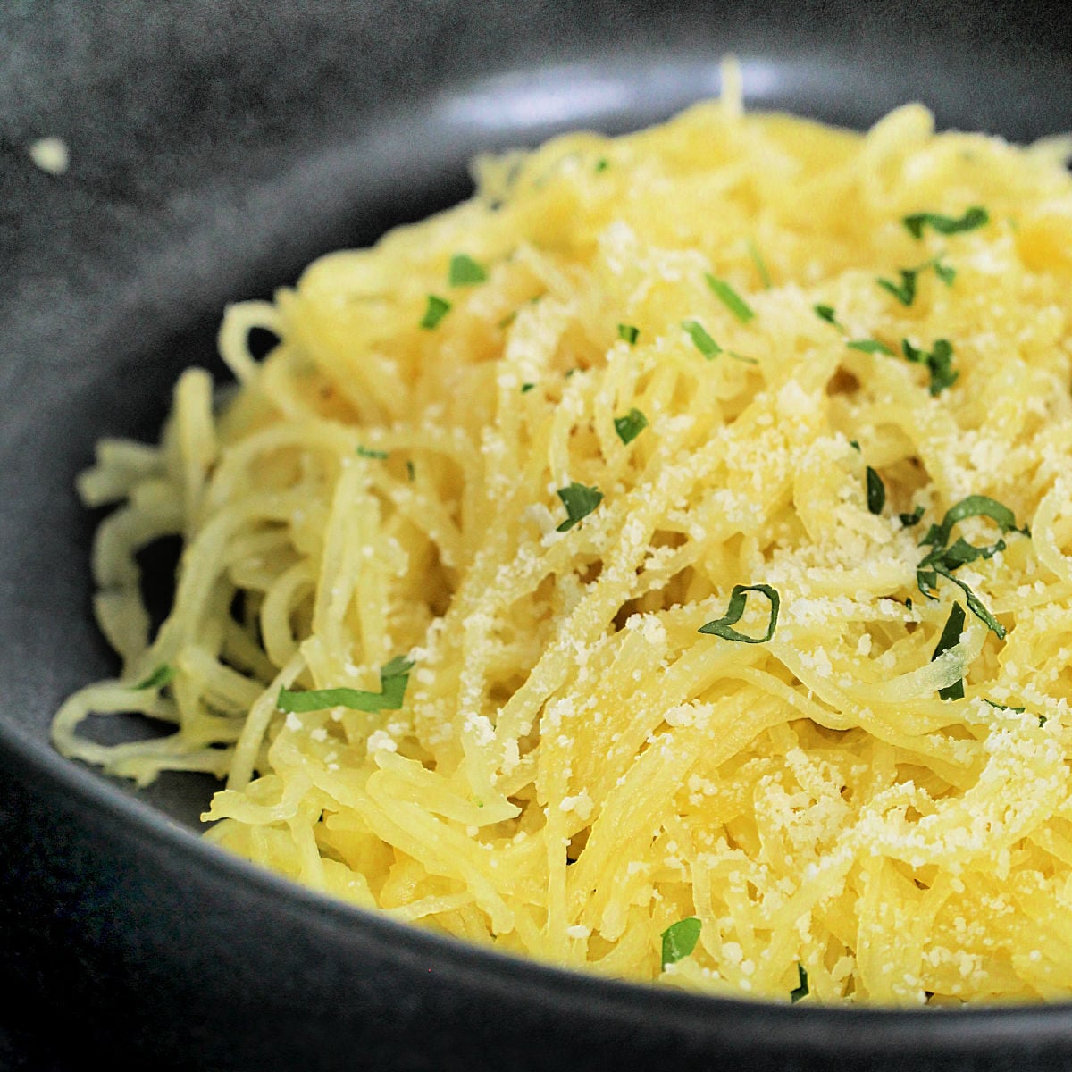 A bowl of spaghetti squash.