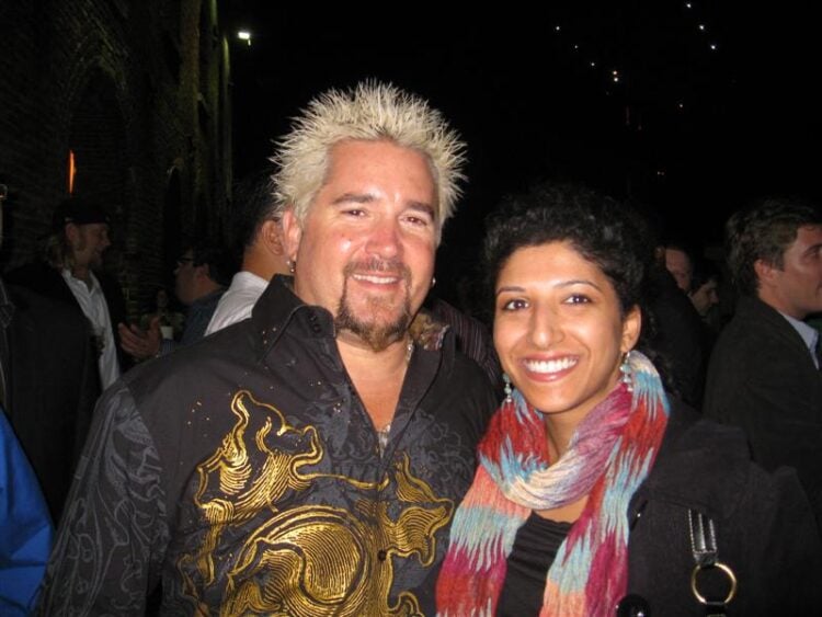 The Foodie Physician, Dr. Sonali Ruder standing with Guy Fieri.