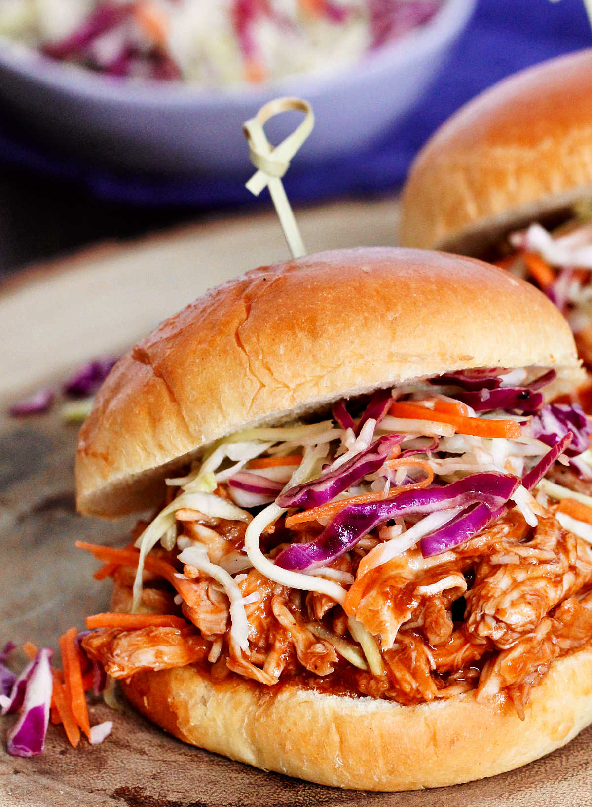 Close up photo of a pulled chicken sandwich.