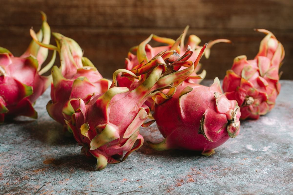 Dragon fruit on a board.