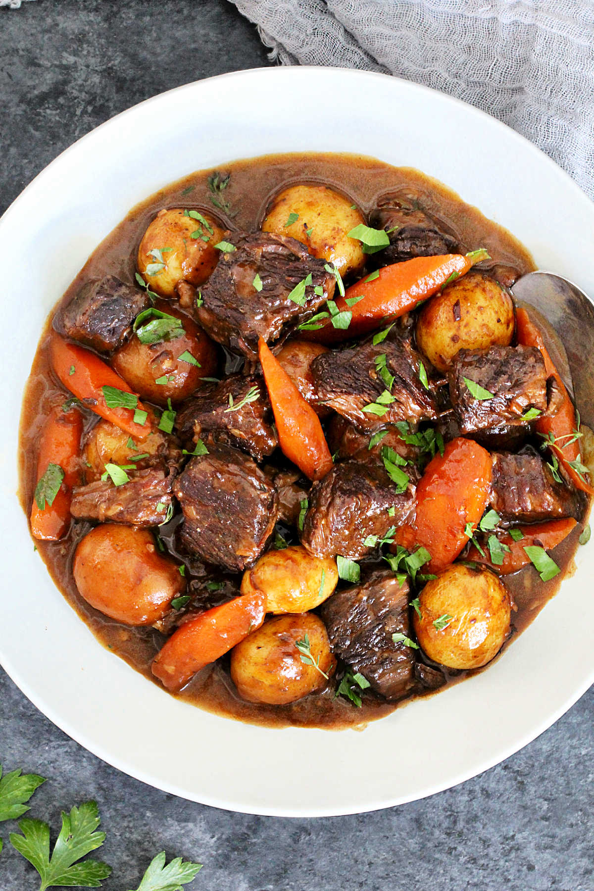 Classic Dutch Oven Beef Stew in a white bowl.