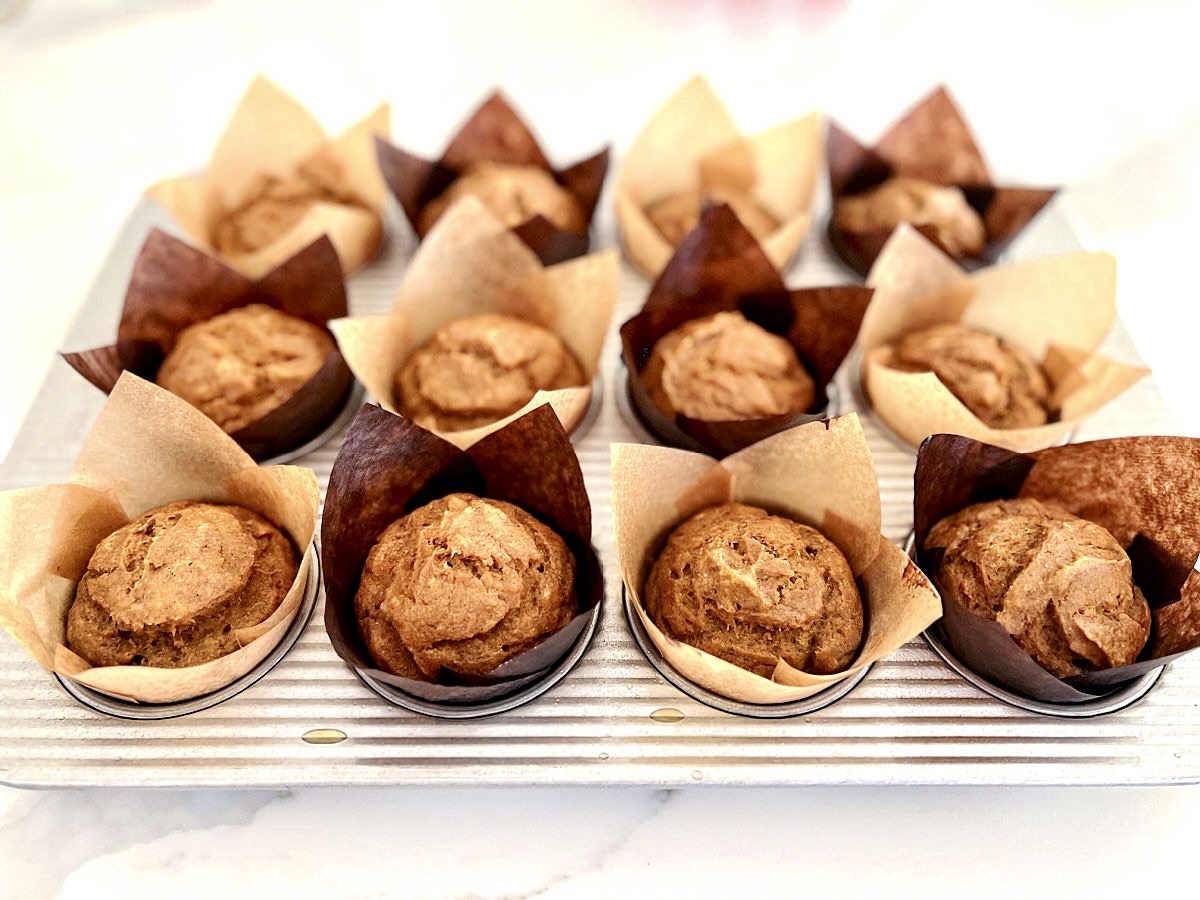 Easy Pumpkin Banana Muffins in a muffin pan.